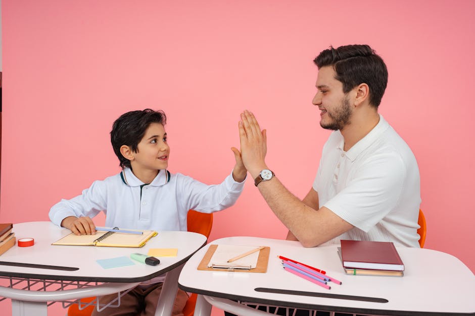 A teacher and student exchanging a high five during a classroom session in Yalova, Türkiye.