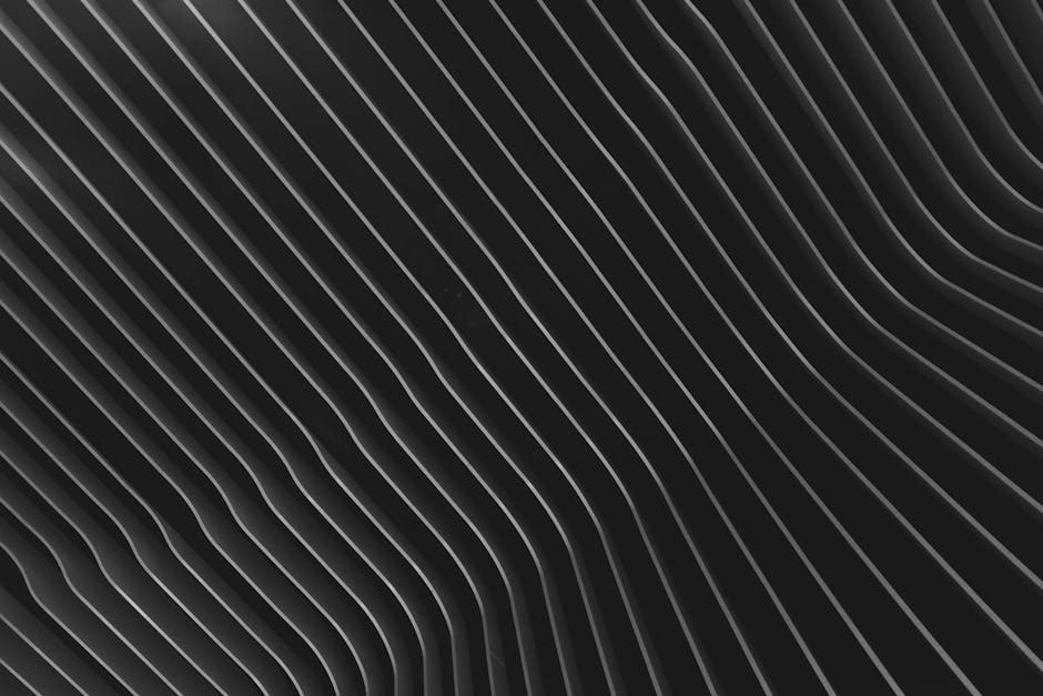 Stylish abstract black wave pattern conveying depth and texture, perfect for backgrounds and design projects.