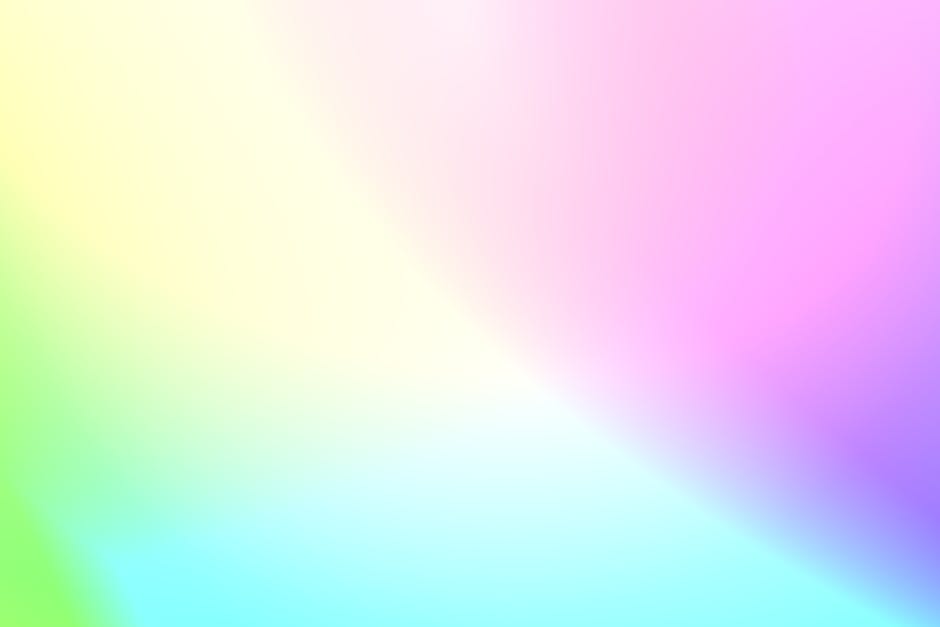 A smooth, vibrant gradient of pastel colors creating a soft, abstract backdrop.
