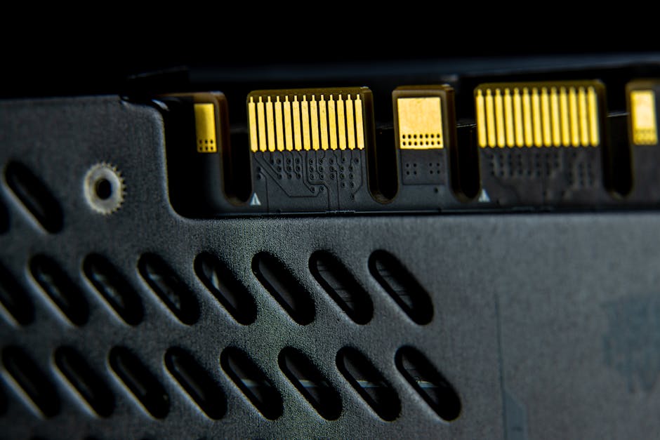 Macro shot of a computer part showcasing intricate electronic connections.
