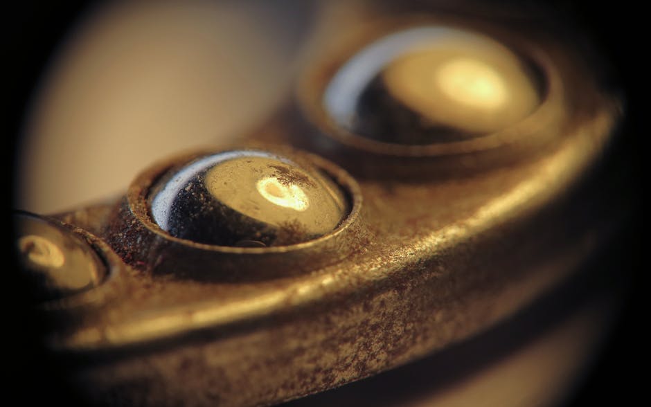 Close-up macro view of metal ball bearings showcasing industrial texture and detail.